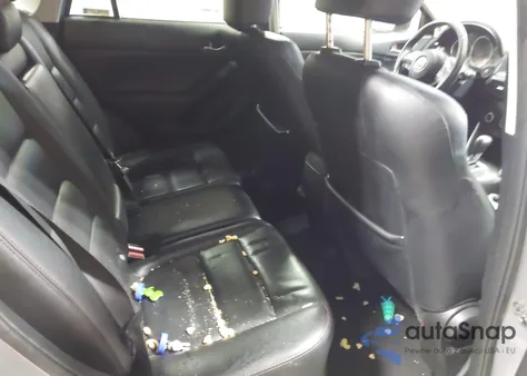 2015 Mazda Cx-5 Grand Touring z USA, uszkodzony, nr VIN JM3KE4DY4F0448016